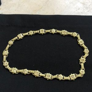 Fashion jewelry necklace and clip on earrings.